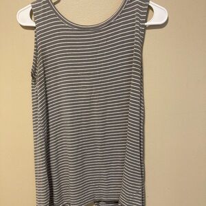 Gray & White striped Old Navy tank top with slit back . It is loose for an XS.